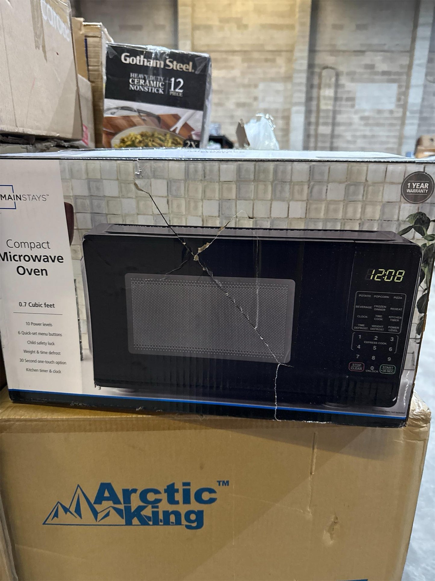 Mainstays 0.7 ft. Countertop Microwave Oven, 700 Watts, Black(Black)